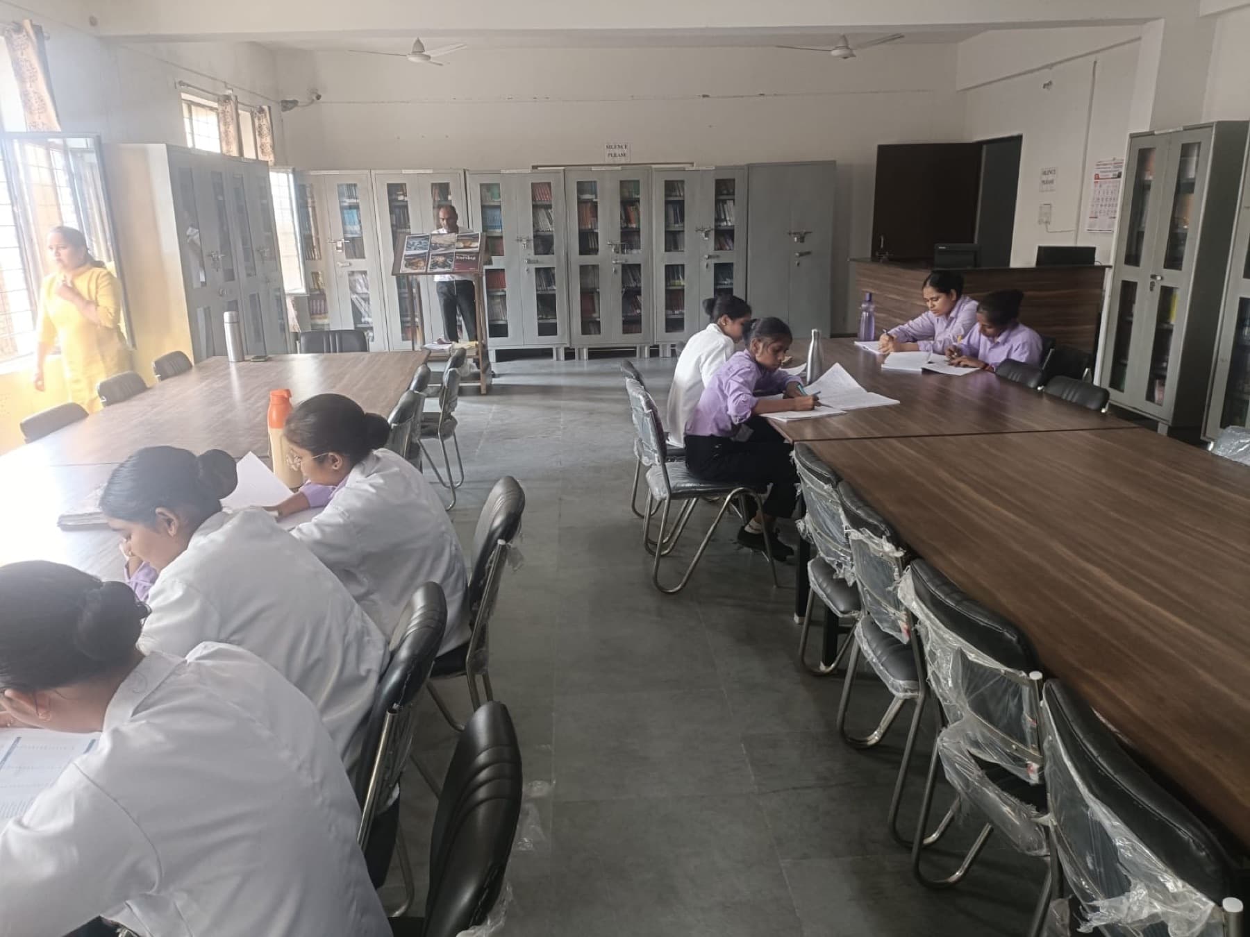 Students reading in the college library